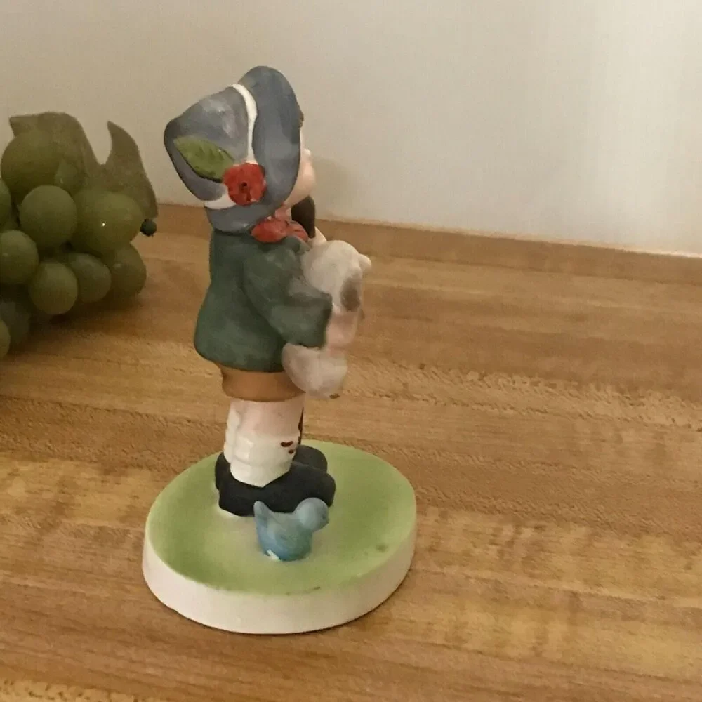 #1090 Flambro Porcelain Vintage boy with dog figurine